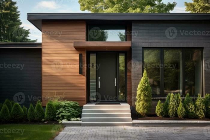 Contemporary exterior of home with dark ceramic tiles as siding of ...